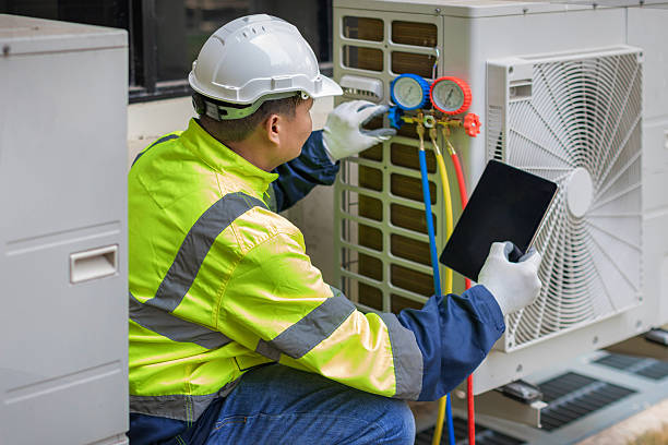 Professional Air Conditioning Repair technician working in Lecompton, KS
